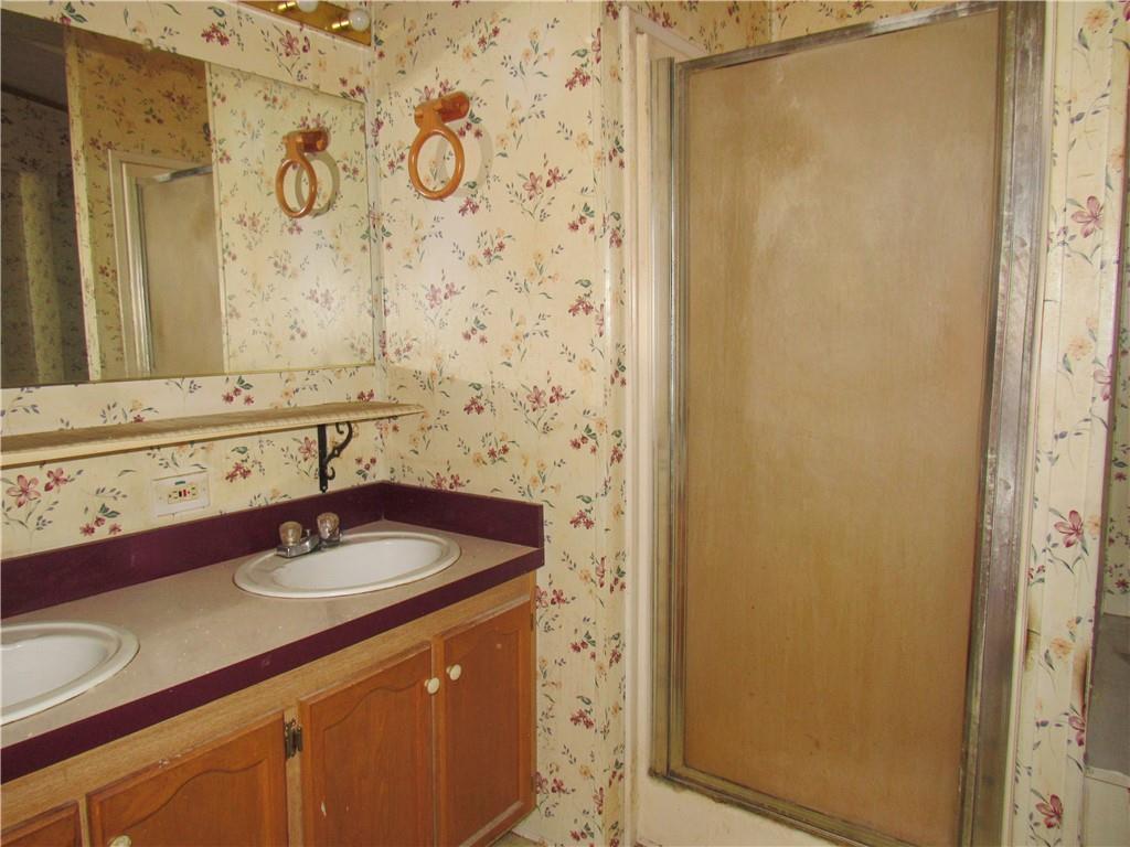 121 Hoy Run Road Spraggs, PA 15362 - Photo 25 of 25 a bathroom with a sink and a mirror