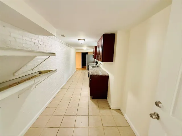 a hallway with a television