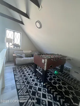 a bathroom with a black white checkered floor