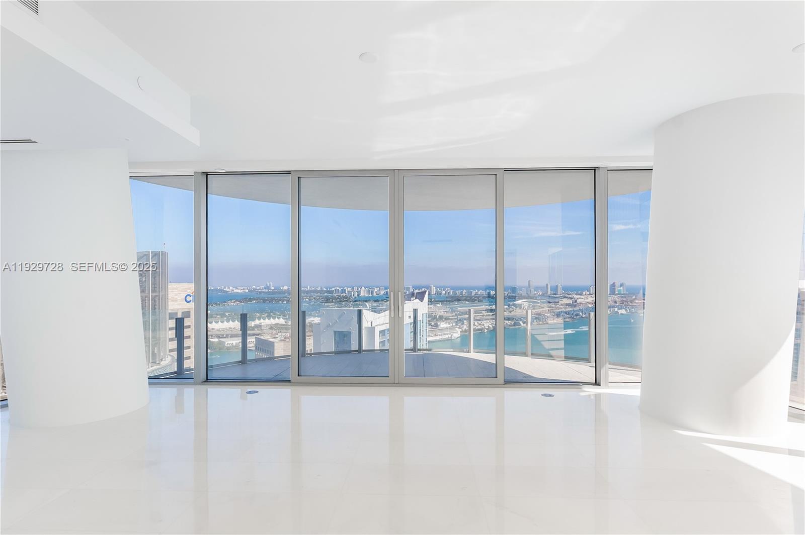 300 Biscayne Blvd Way, Unit 4401 Miami, FL 33131 - Photo 8 of 21 a very nice looking room with a large window