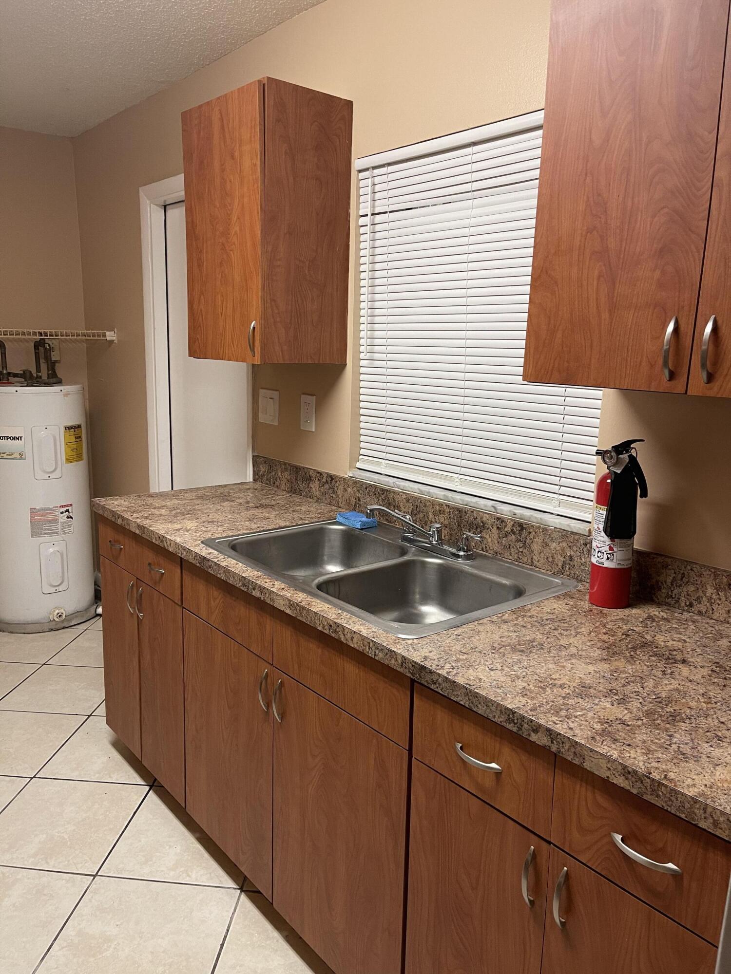 940 West 36th Street, Unit 1 Riviera Beach, FL 33404 - Photo 3 of 9 IMG_9211