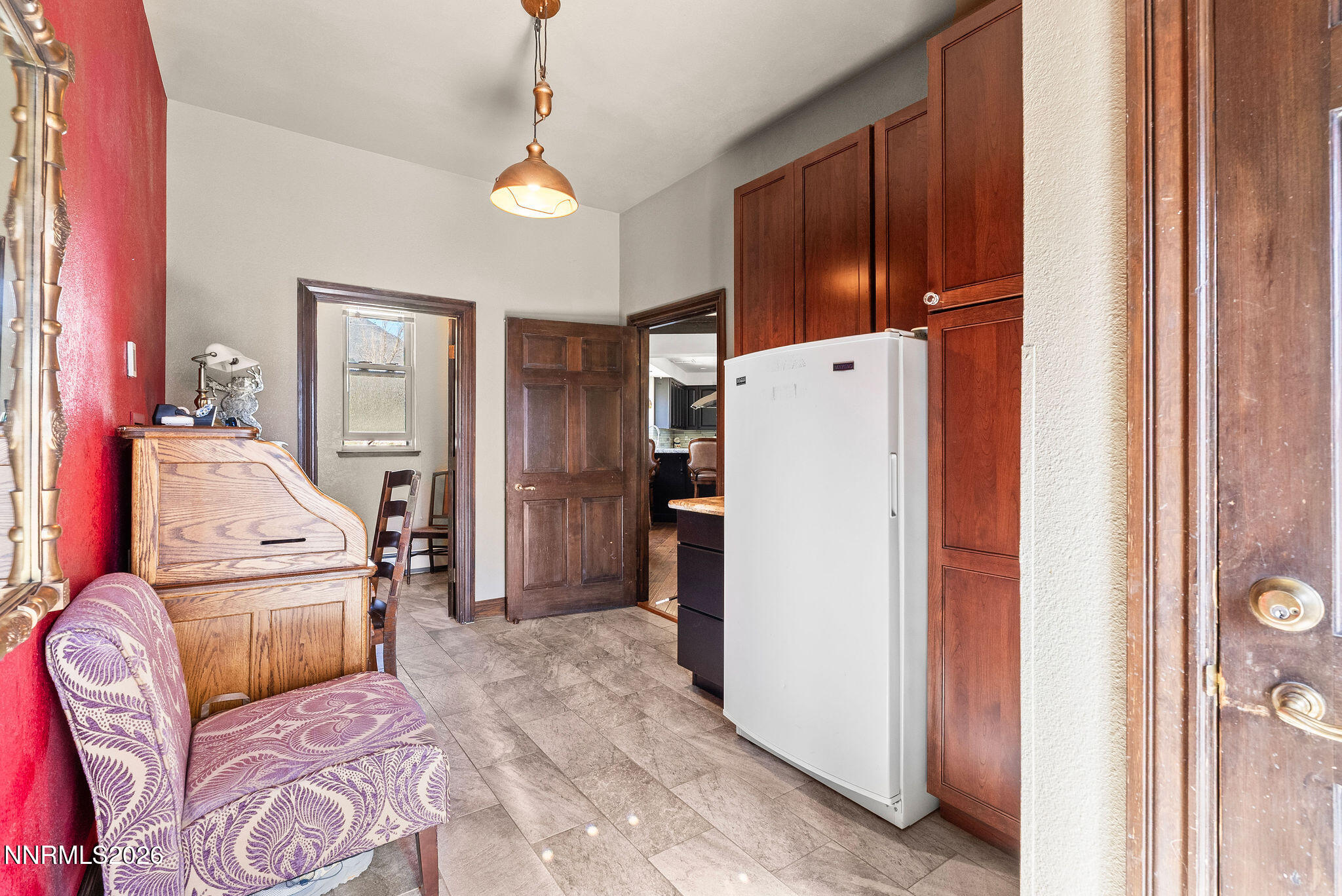 220 Limousin Court Genoa, NV 89411 - Photo 18 of 77 a kitchen with a refrigerator and a sink