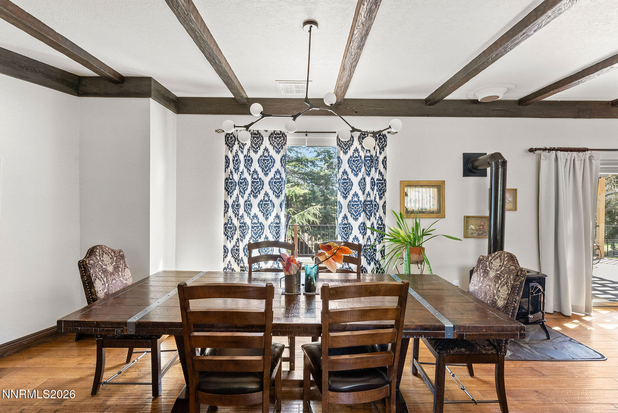 220 Limousin Court Genoa, NV 89411 - Photo 24 of 77 a view of a dining room with furniture and window
