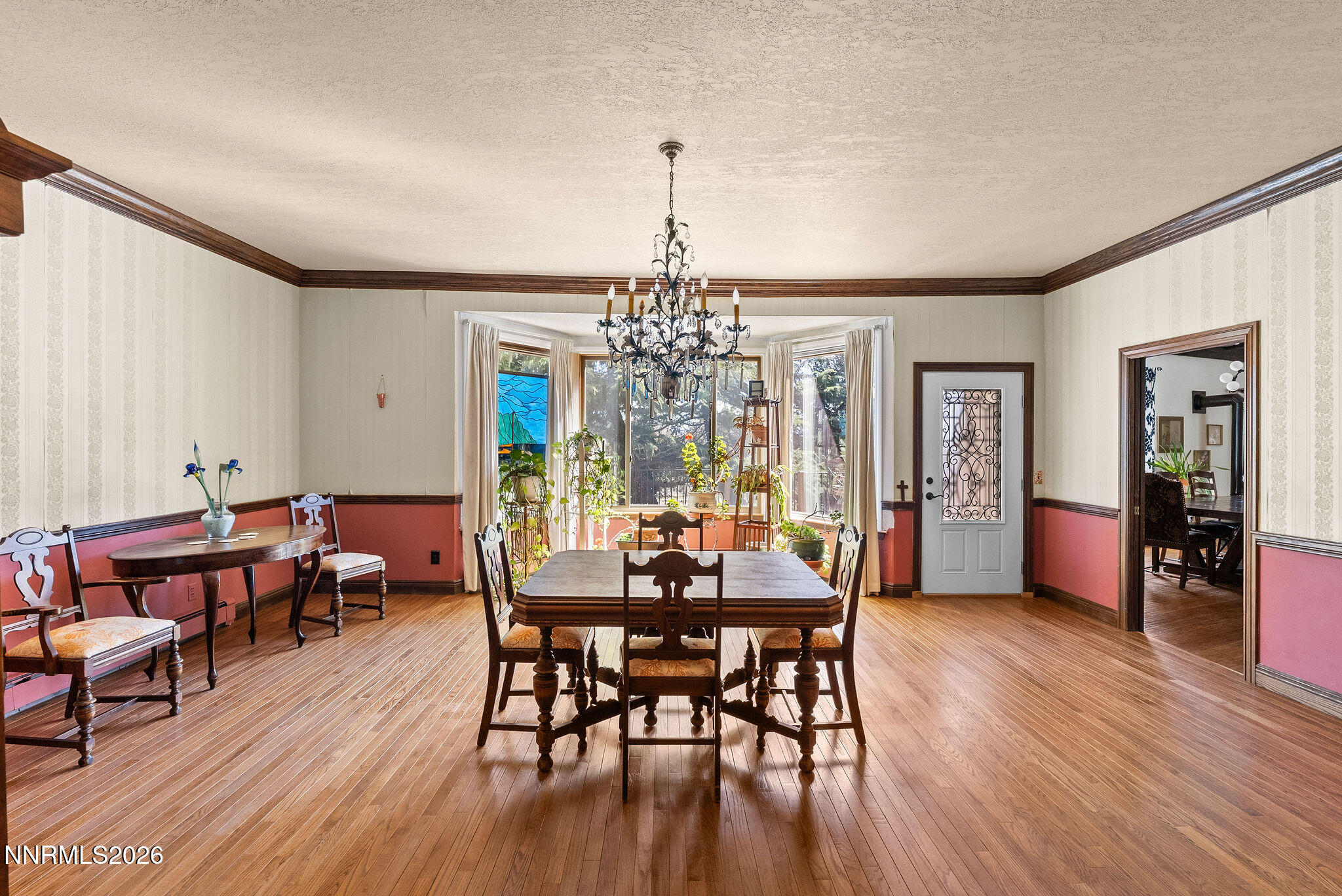220 Limousin Court Genoa, NV 89411 - Photo 35 of 77 a view of a dining room with furniture window and wooden floor