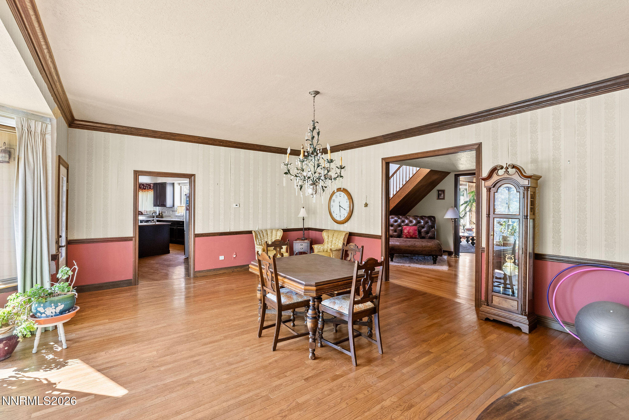 220 Limousin Court Genoa, NV 89411 - Photo 37 of 77 a view of a dining room with furniture window and wooden floor