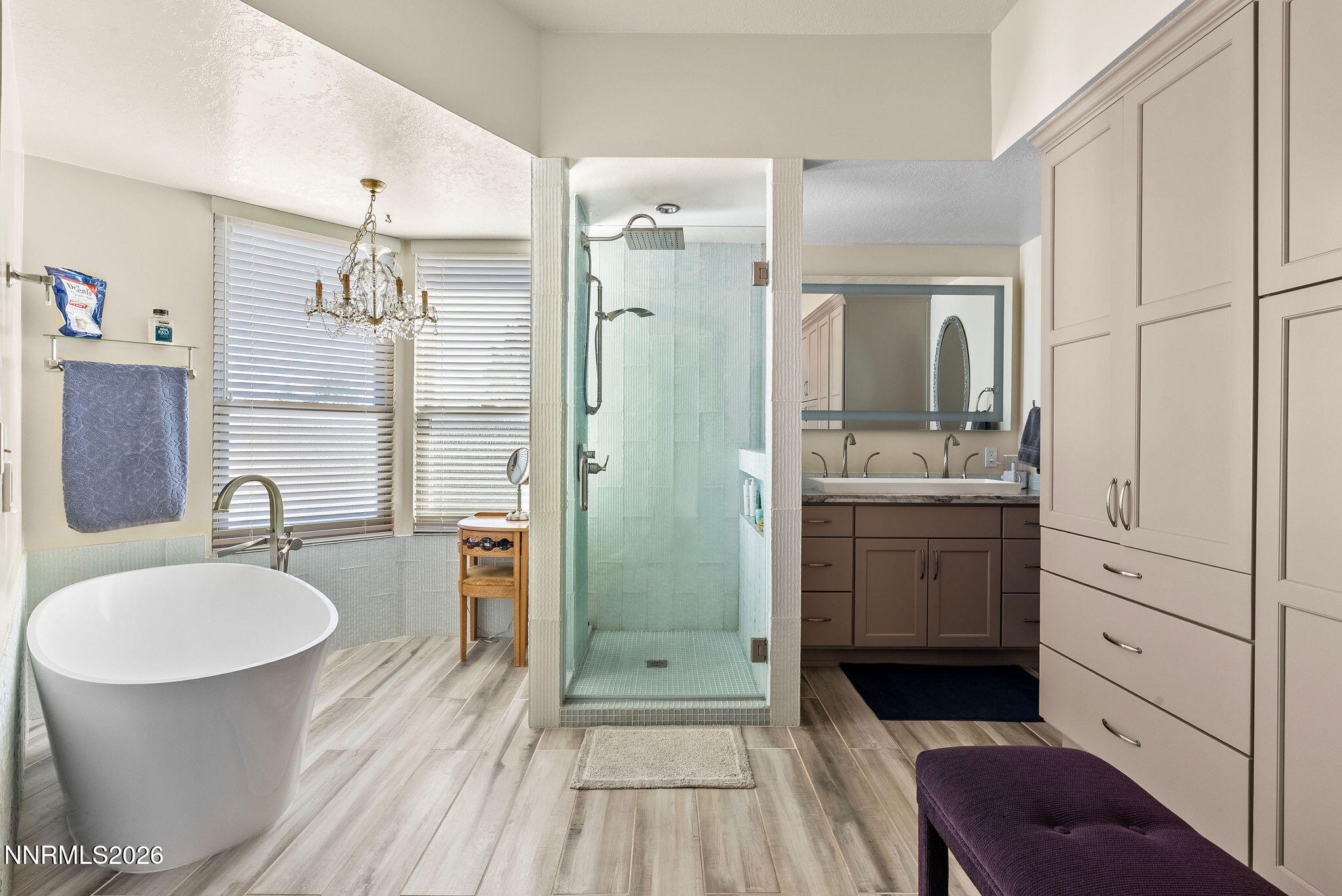 220 Limousin Court Genoa, NV 89411 - Photo 49 of 77 a bathroom with a sink a toilet a mirror and shower