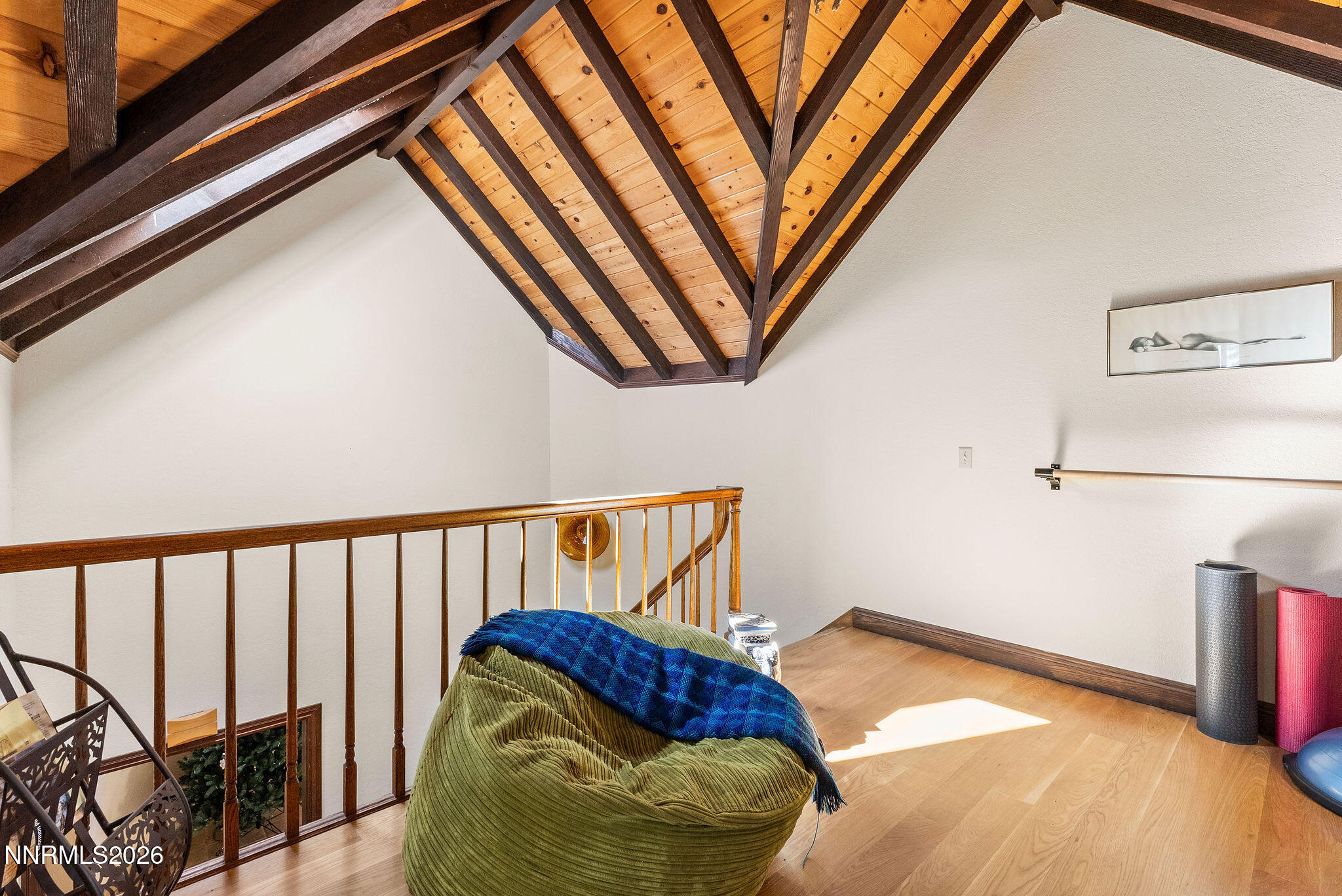 220 Limousin Court Genoa, NV 89411 - Photo 56 of 77 a bedroom with a bed and a chandelier