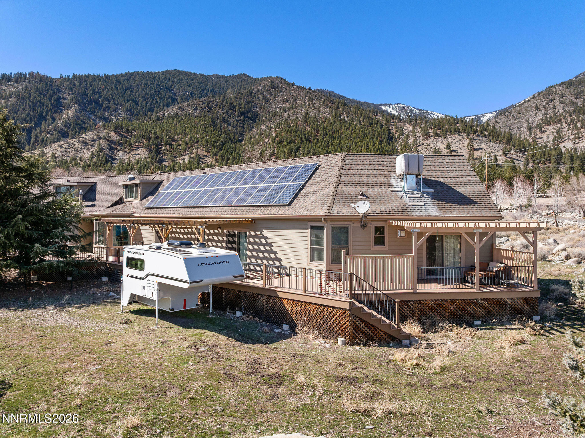 220 Limousin Court Genoa, NV 89411 - Photo 70 of 77 an aerial view of a house with a yard