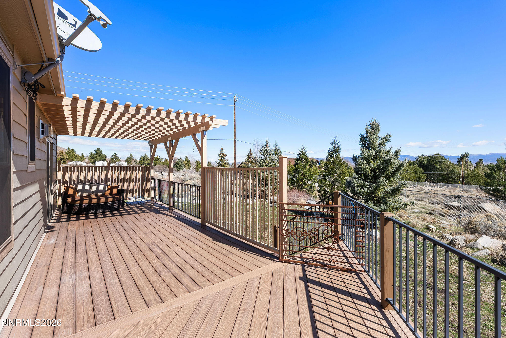 220 Limousin Court Genoa, NV 89411 - Photo 75 of 77 a view of balcony with wooden floor
