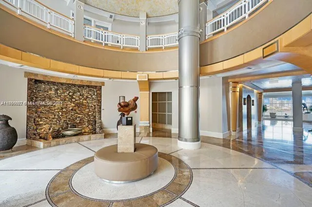 a front view of a house with outdoor seating