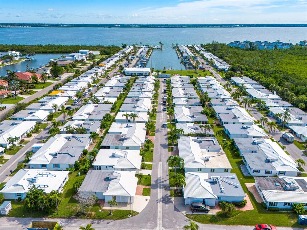 667 El Centro Longboat Key, FL 34228 - Photo 28 of 41 an aerial view of residential building and lake