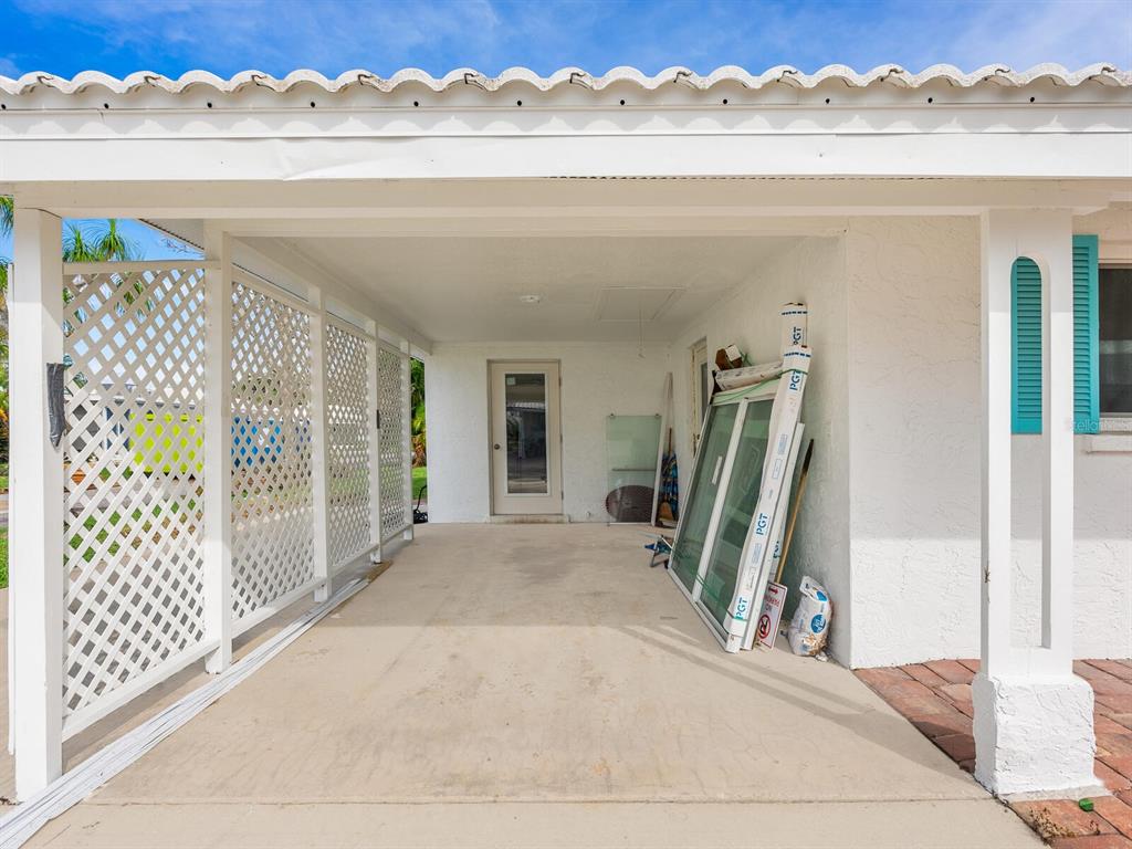 667 El Centro Longboat Key, FL 34228 - Photo 31 of 41 a view of a living room and a window
