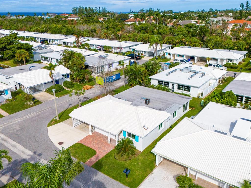 667 El Centro Longboat Key, FL 34228 - Photo 5 of 41 an aerial view of a house with a garden