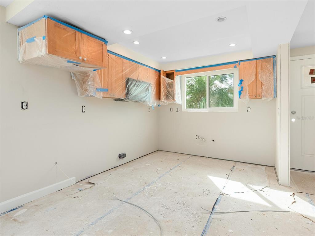 667 El Centro Longboat Key, FL 34228 - Photo 10 of 41 a view of an empty room with a window