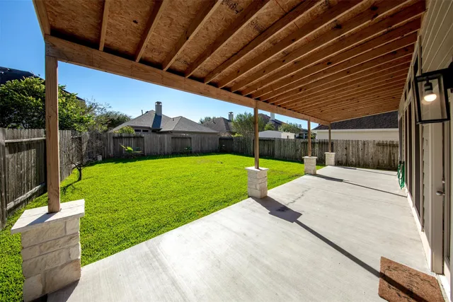 a view of a backyard with a garden