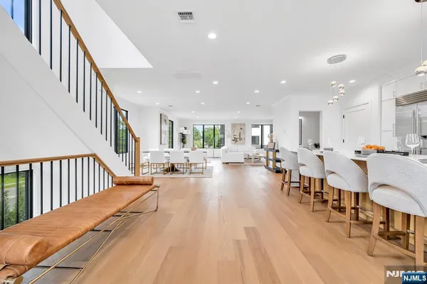 a view of a living room and dining room