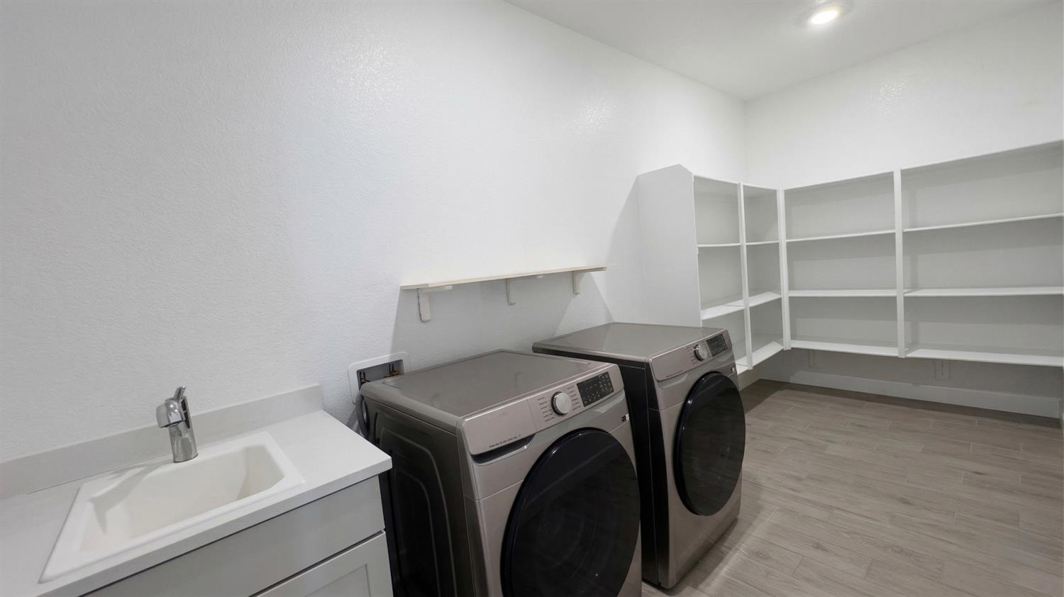 1072 Blue Range Way Roseville, CA 95747 - Photo 19 of 26 a utility room with dryer and washer