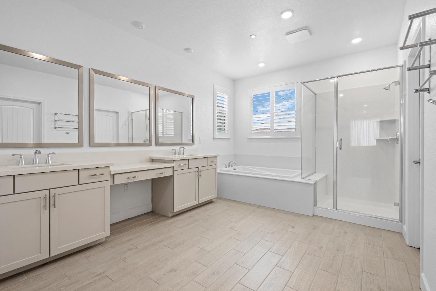 1072 Blue Range Way Roseville, CA 95747 - Photo 21 of 26 a bathroom with a granite countertop sink mirror and a bathtub