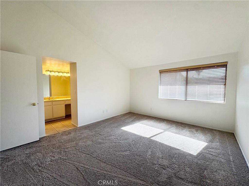 18223 Soledad Canyon Road, Unit 29 Canyon Country, CA 91387 - Photo 10 of 23 an empty room with a empty space and windows