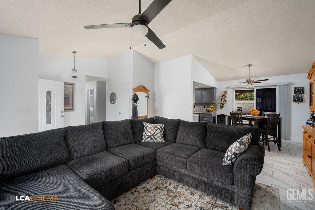 Undisclosed Address Delano, CA 93215 - Photo 11 of 35 a living room with furniture and a ceiling fan