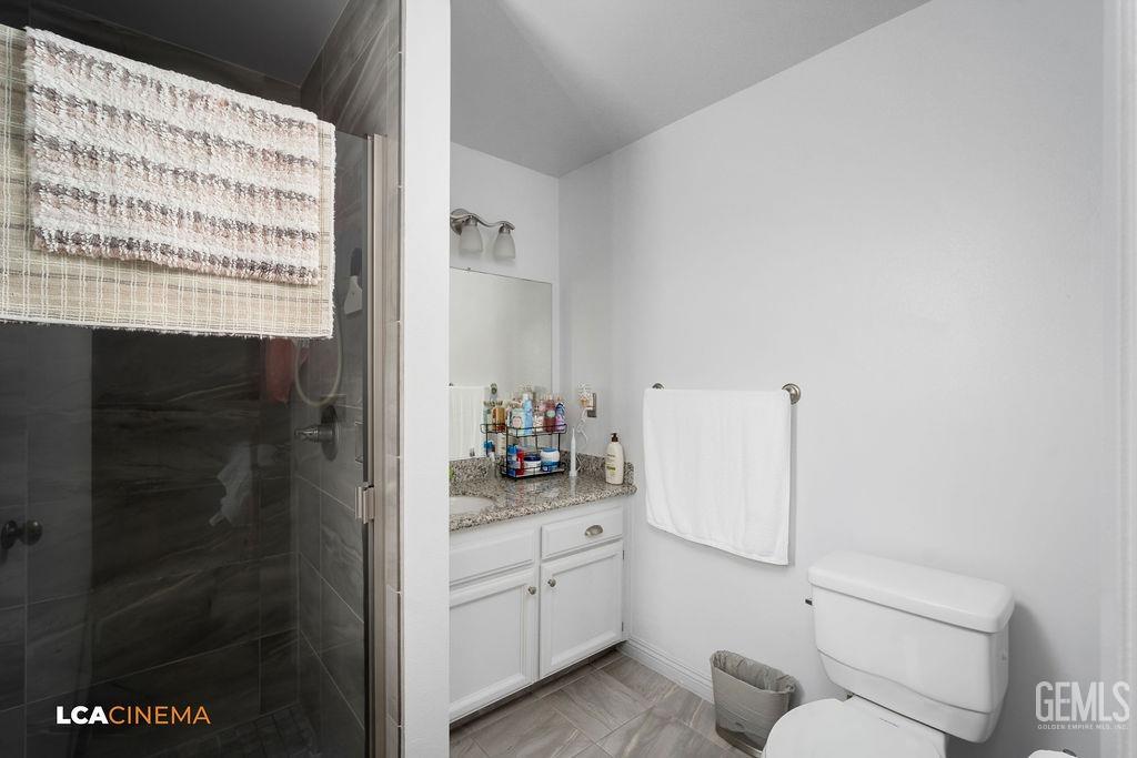 Undisclosed Address Delano, CA 93215 - Photo 24 of 35 a bathroom with a sink and a mirror