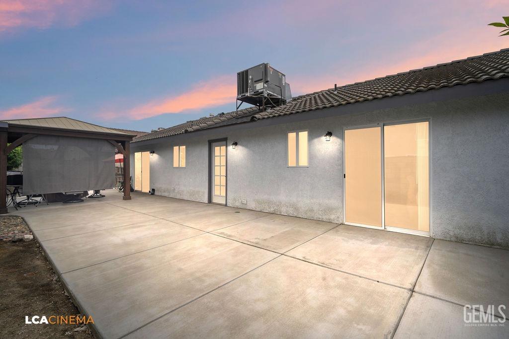 Undisclosed Address Delano, CA 93215 - Photo 25 of 35 a view of a house with a garage