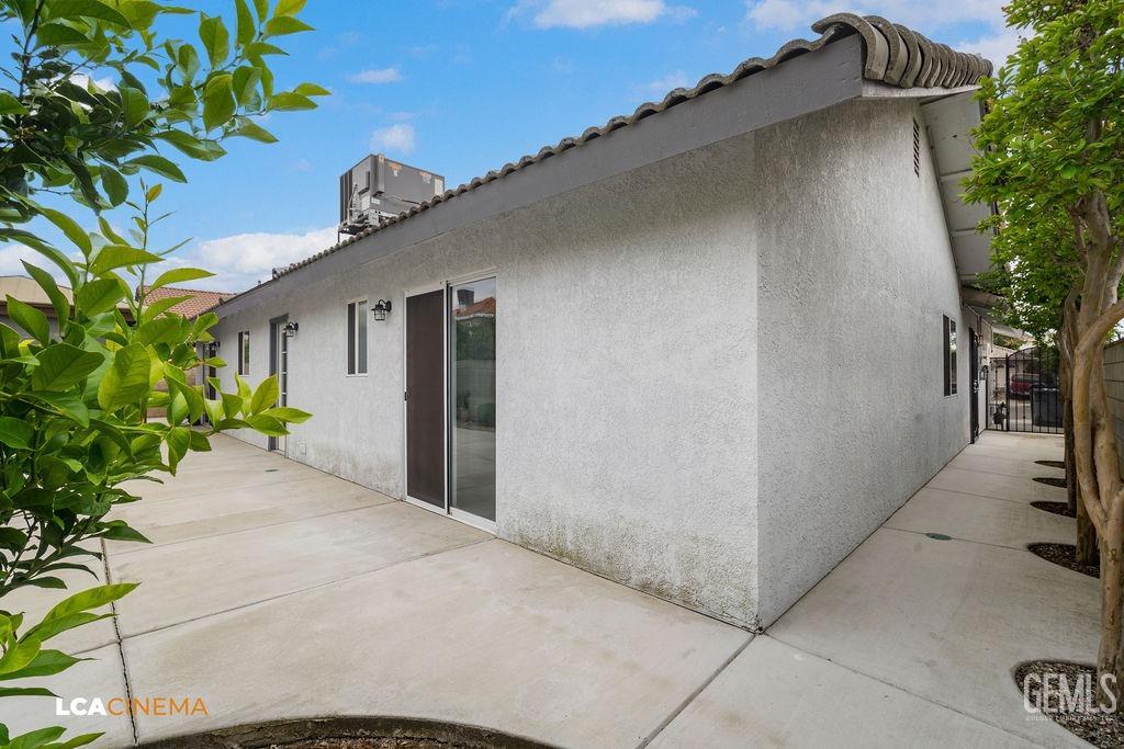Undisclosed Address Delano, CA 93215 - Photo 27 of 35 a couple of potted plants in front of door