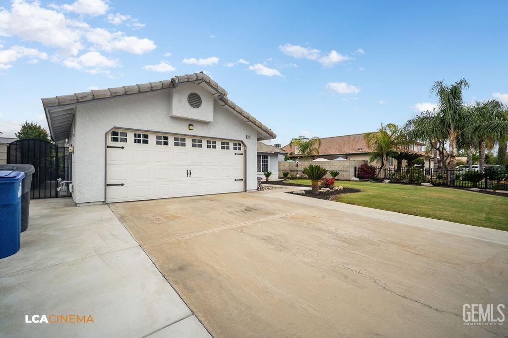 Undisclosed Address Delano, CA 93215 - Photo 3 of 35 a view of a house with a yard