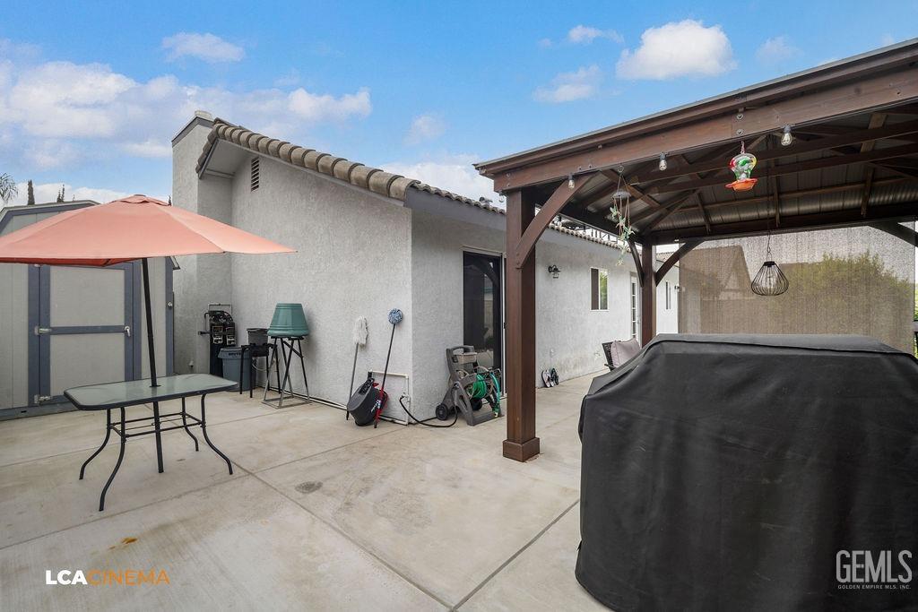 Undisclosed Address Delano, CA 93215 - Photo 31 of 35 a garage with table and chairs