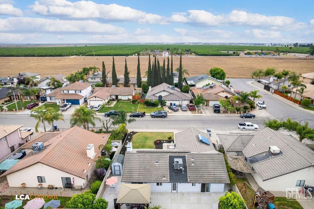 Undisclosed Address Delano, CA 93215 - Photo 9 of 35 an aerial view of a house with lake view and mountain view