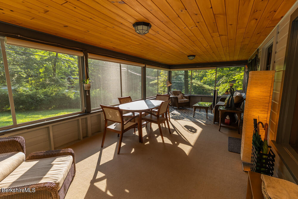 3 Indian Road Stockbridge, MA 01262 - Photo 3 of 23 a view of a dining room with furniture window and outside view