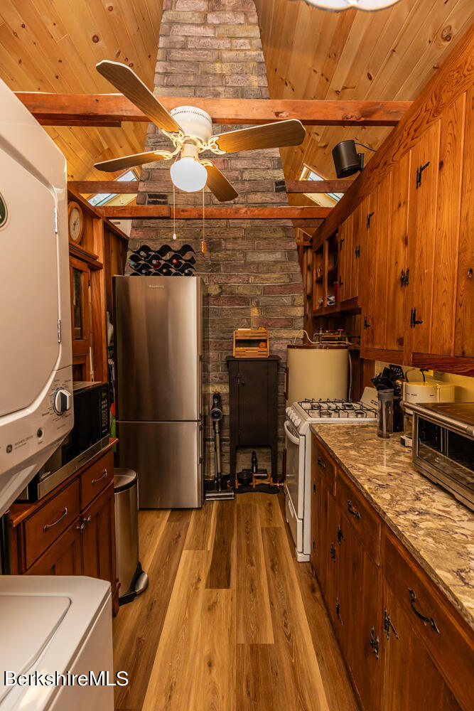 3 Indian Road Stockbridge, MA 01262 - Photo 9 of 23 a kitchen with refrigerator and stove