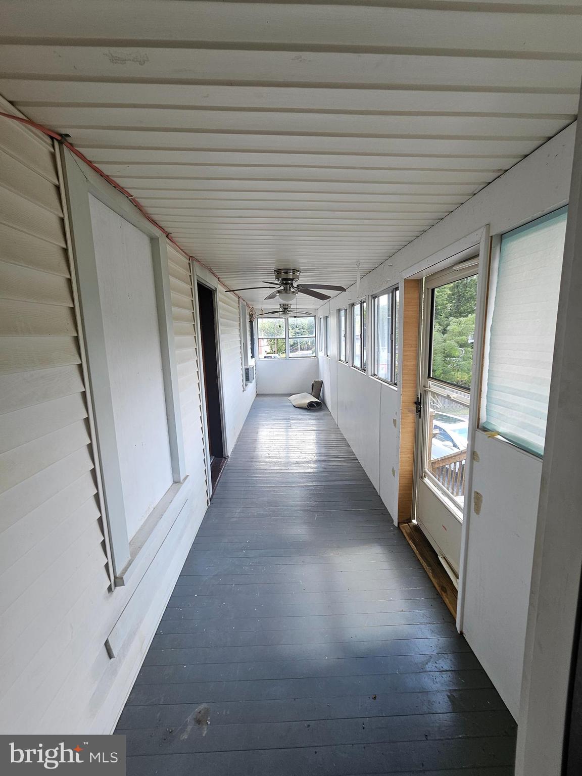 449 Harmison Place Romney, WV 26757 - Photo 16 of 74 enclosed porch to top level apart 25x6