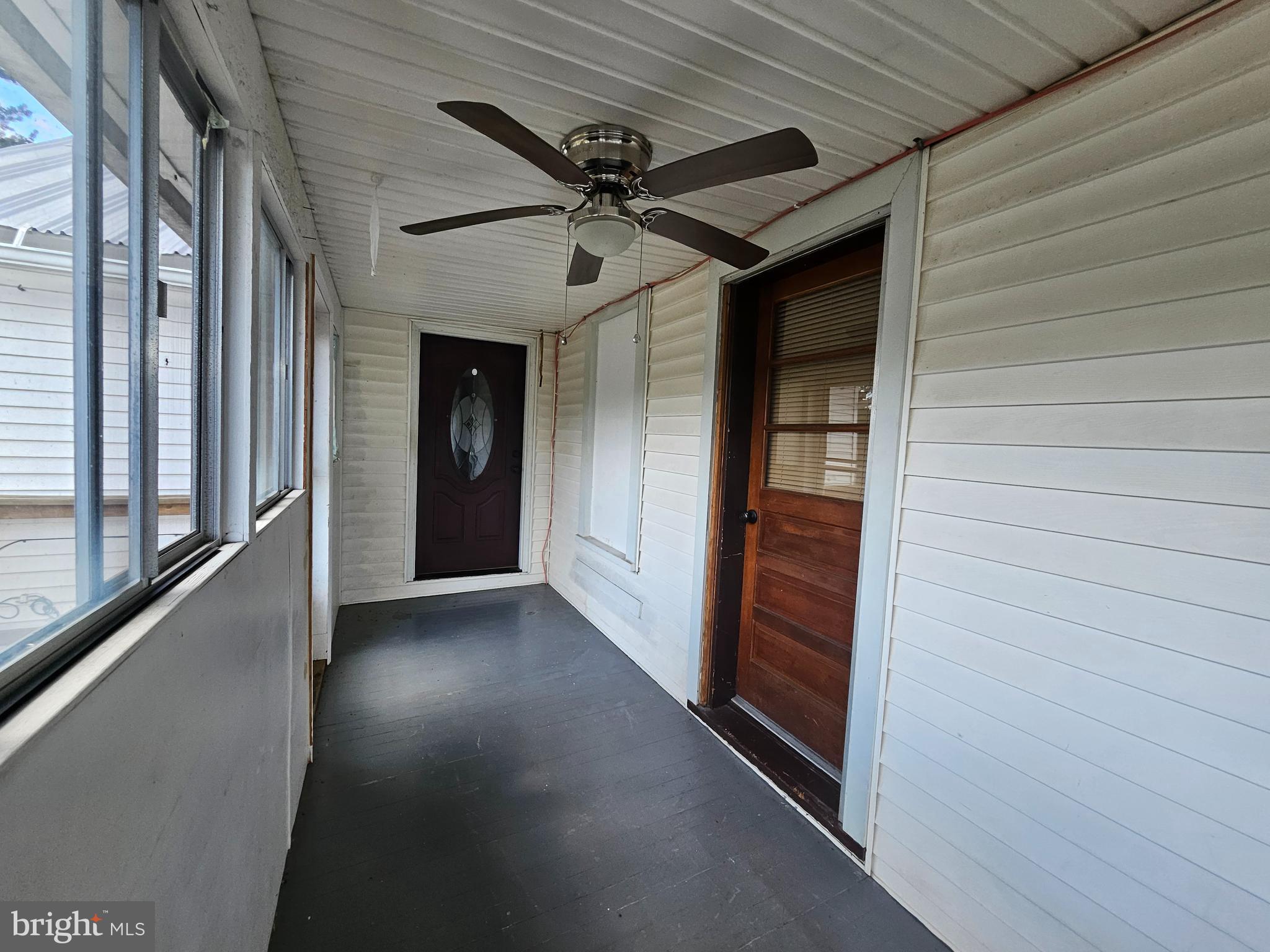 449 Harmison Place Romney, WV 26757 - Photo 18 of 74 enclosed porch to top level apart 25x6
