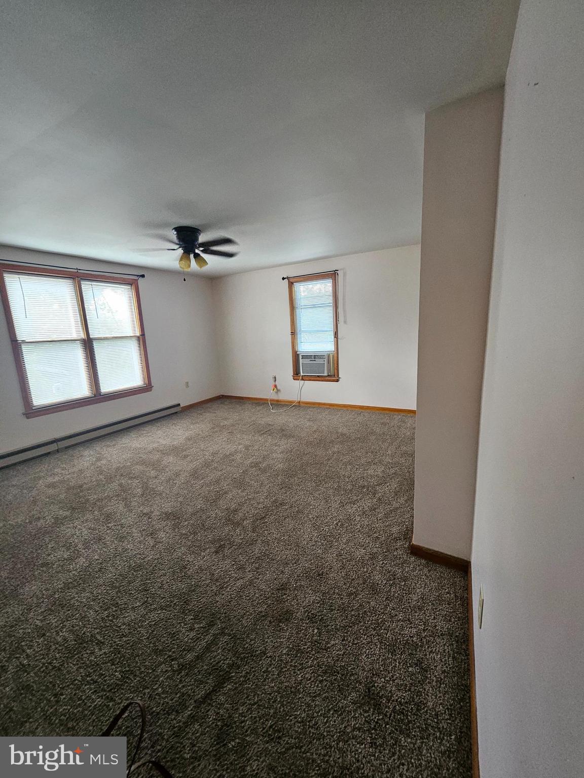 449 Harmison Place Romney, WV 26757 - Photo 25 of 74 an empty room with a empty space and windows