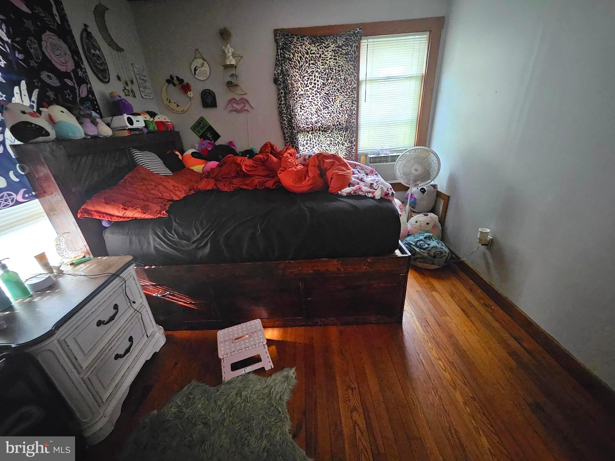 449 Harmison Place Romney, WV 26757 - Photo 49 of 74 a bed sitting in a bedroom next to a window