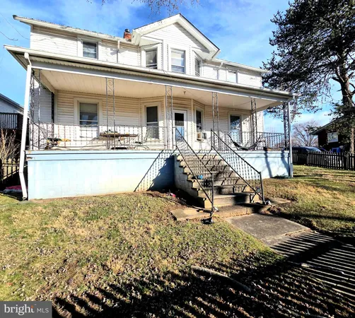a bathroom with a sink toilet and tub