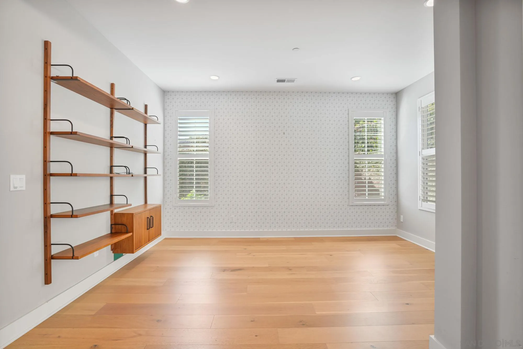 833 Channel Island Drive Encinitas, CA 92024 - Photo 15 of 38 a view of livingroom with an empty space and wooden floor