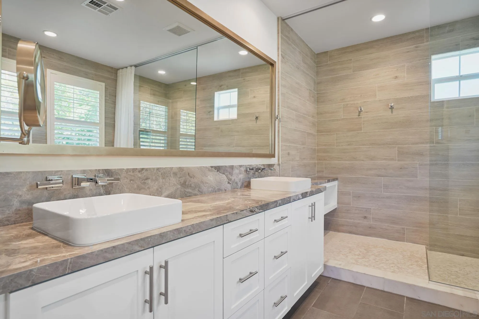 833 Channel Island Drive Encinitas, CA 92024 - Photo 21 of 38 a bathroom with a granite countertop sink mirror and double