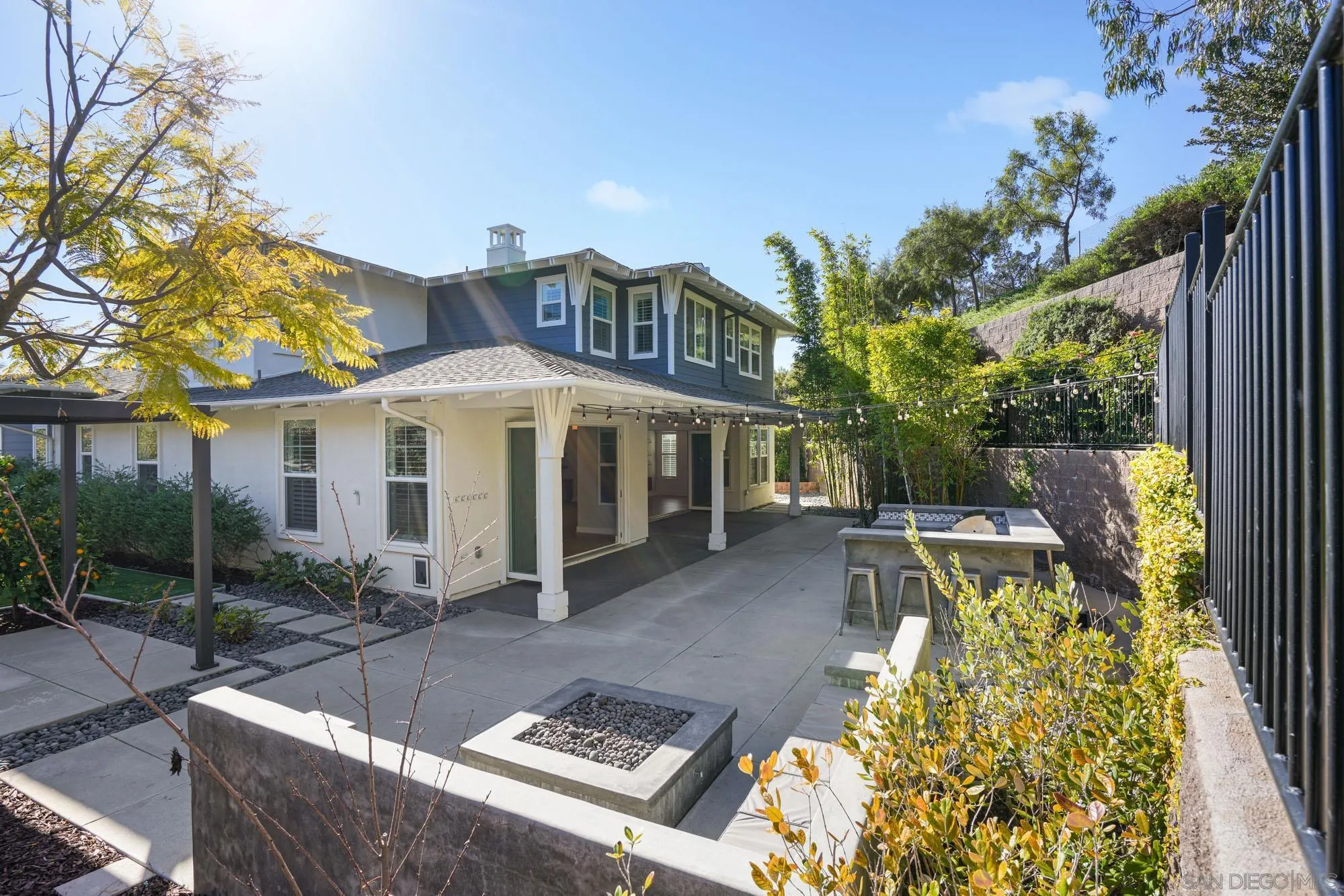 833 Channel Island Drive Encinitas, CA 92024 - Photo 28 of 38 a view of a patio with couches table and chairs and potted plants