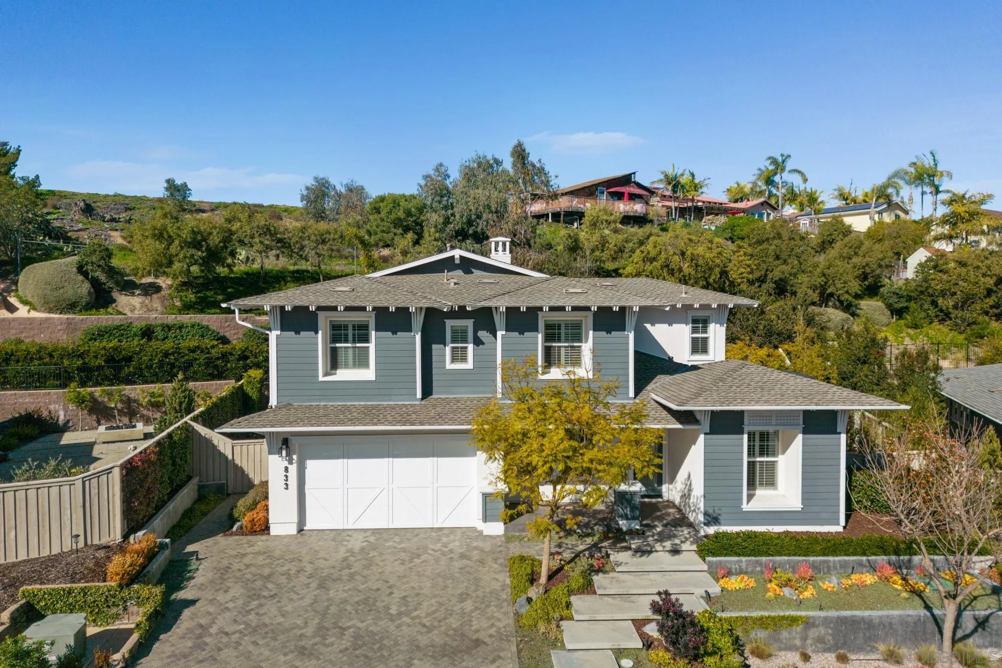 833 Channel Island Drive Encinitas, CA 92024 - Photo 33 of 38 a front view of a house with a yard