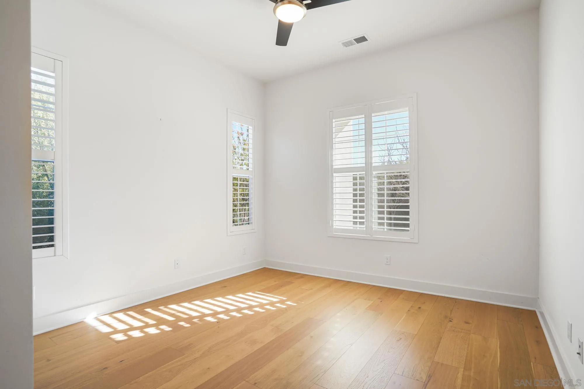 833 Channel Island Drive Encinitas, CA 92024 - Photo 6 of 38 a view of an empty room with a window