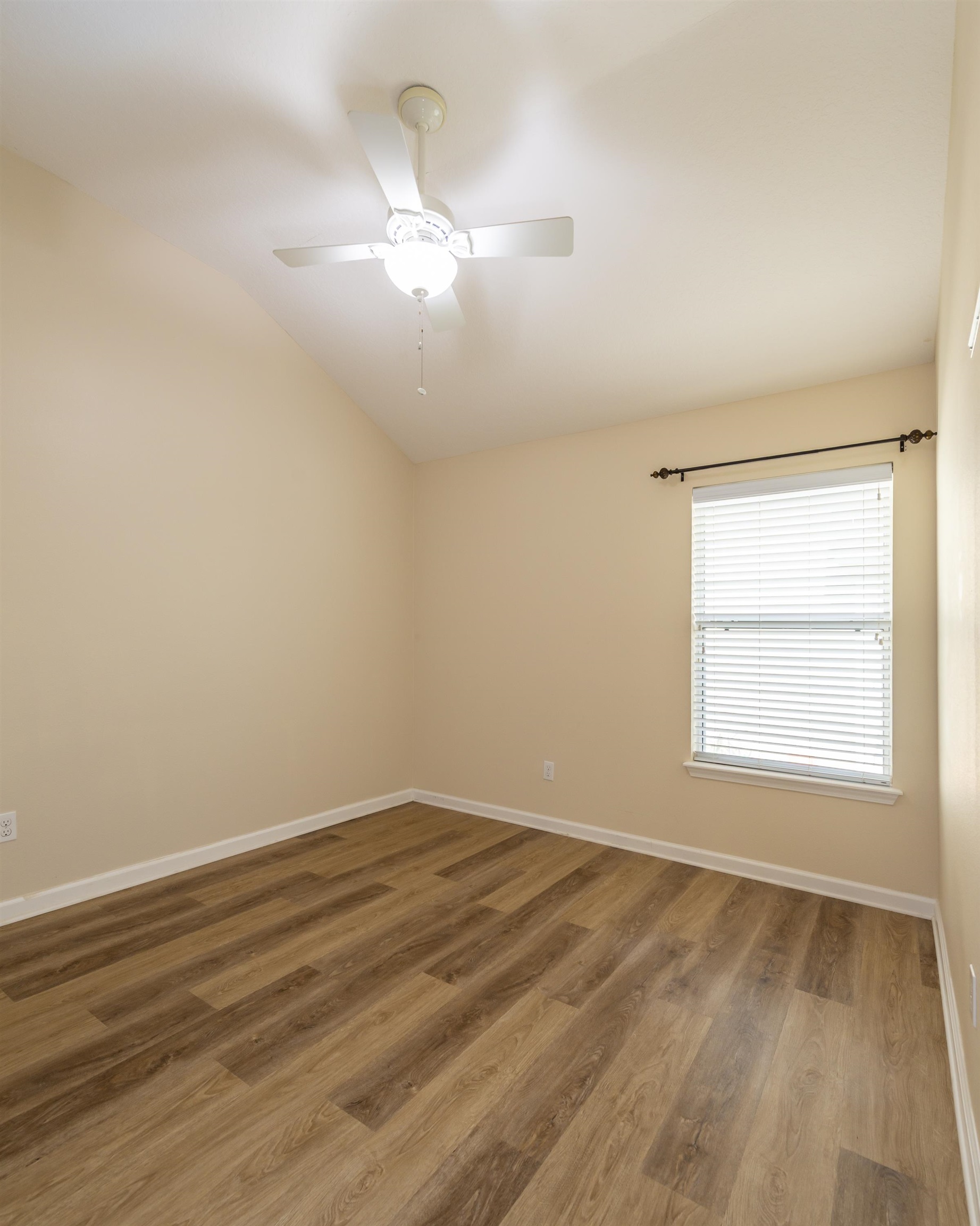 73 Durango Drive St. Augustine, FL 32086 - Photo 16 of 38 wooden floor in an empty room with a window