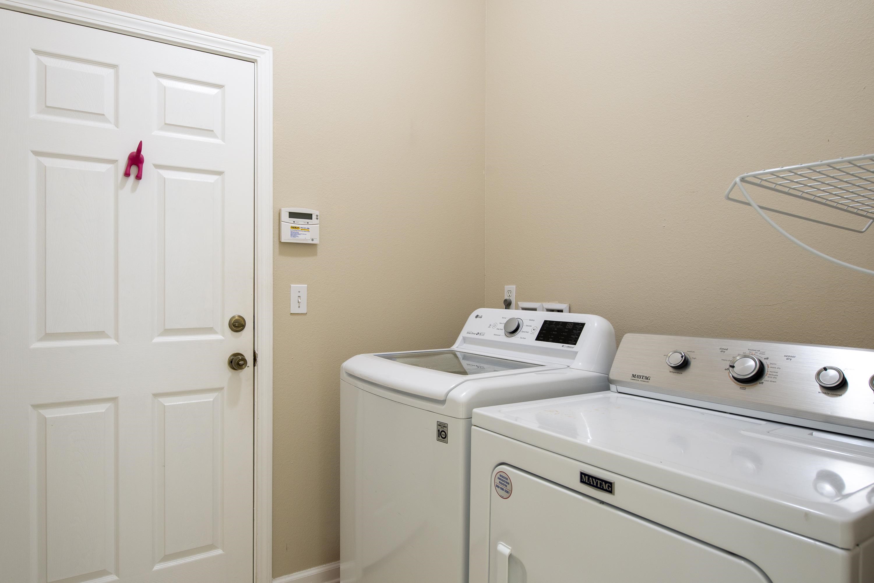 73 Durango Drive St. Augustine, FL 32086 - Photo 29 of 38 a utility room with dryer and washer
