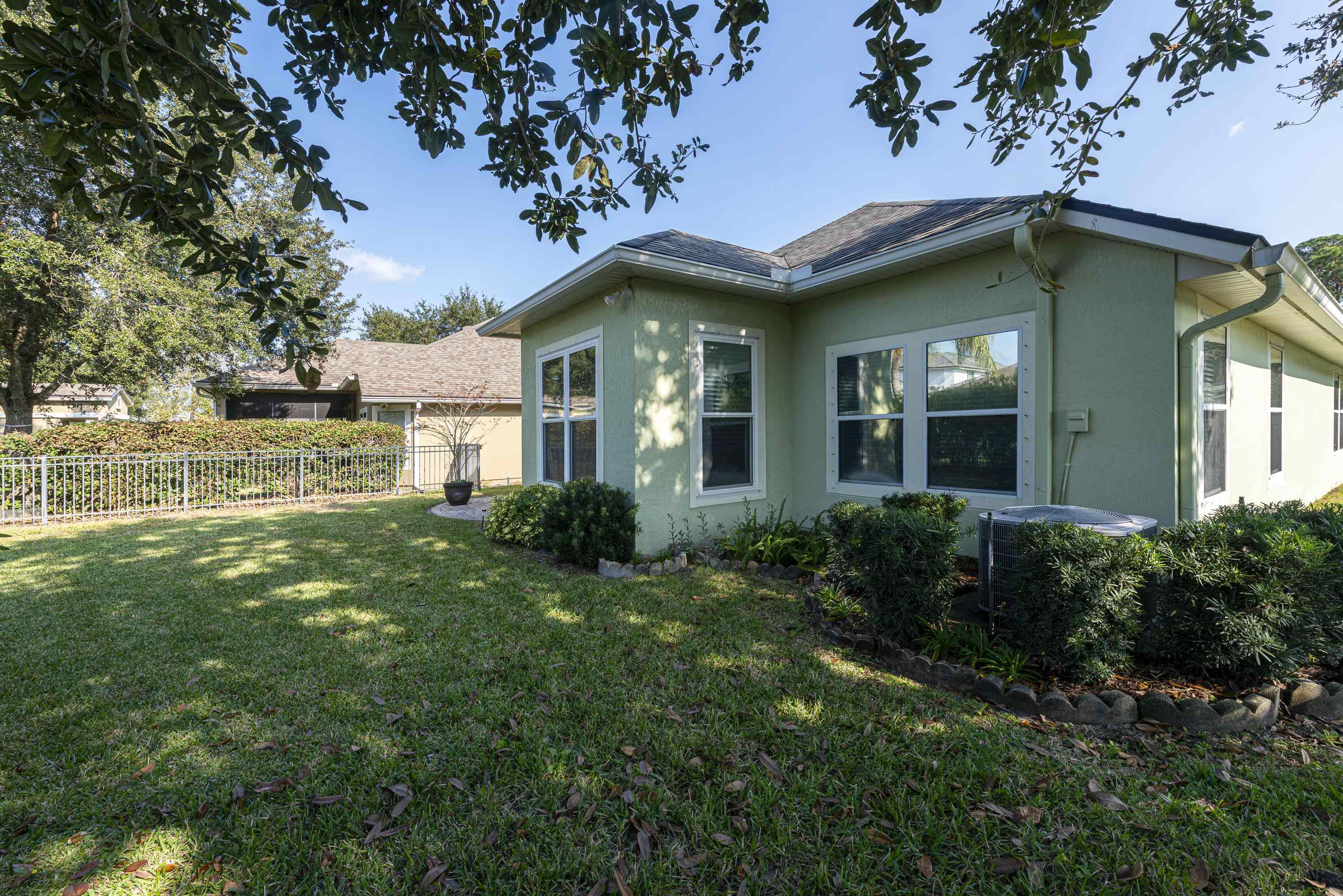 73 Durango Drive St. Augustine, FL 32086 - Photo 33 of 38 a front view of a house with a yard