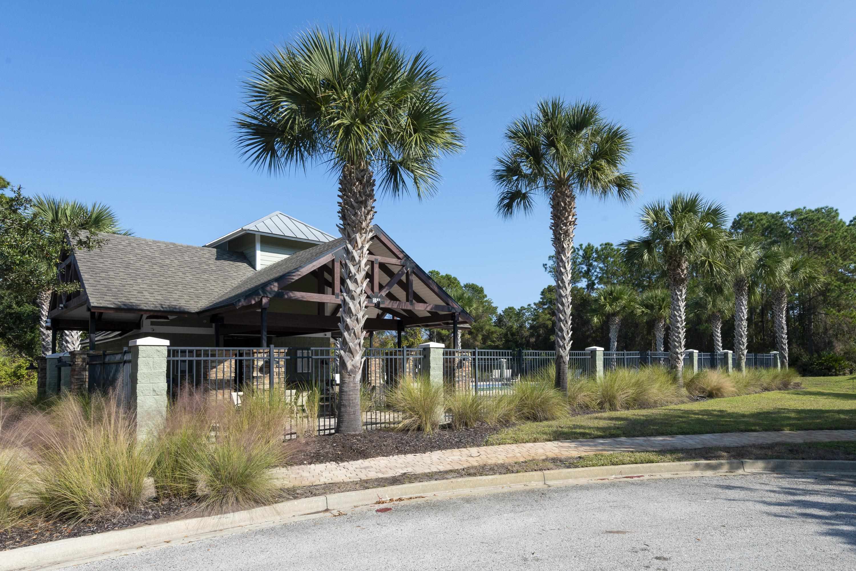 73 Durango Drive St. Augustine, FL 32086 - Photo 36 of 38 a view of a house with swimming pool and a yard