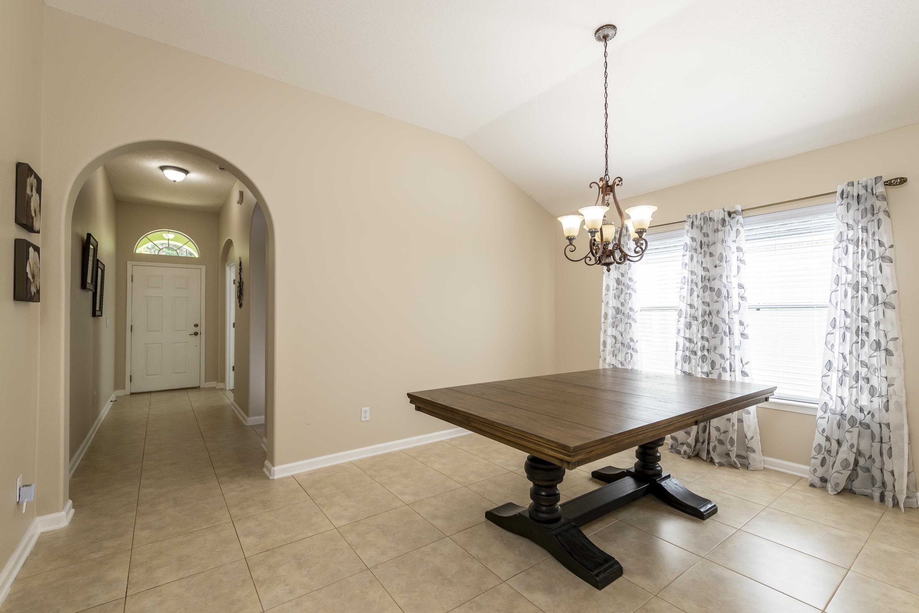73 Durango Drive St. Augustine, FL 32086 - Photo 5 of 38 a view of a room with gym equipment