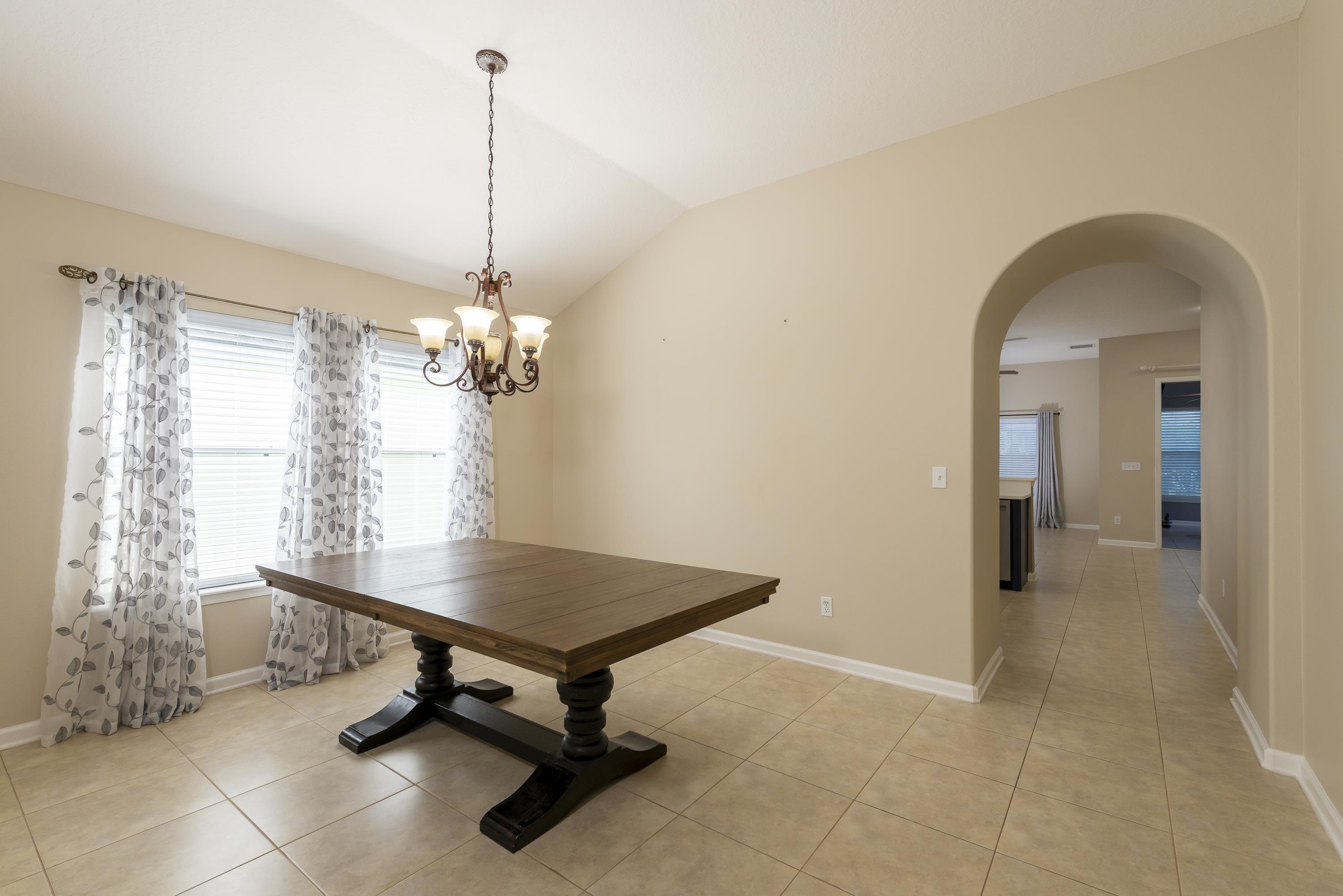 73 Durango Drive St. Augustine, FL 32086 - Photo 6 of 38 a view of a room with gym equipment