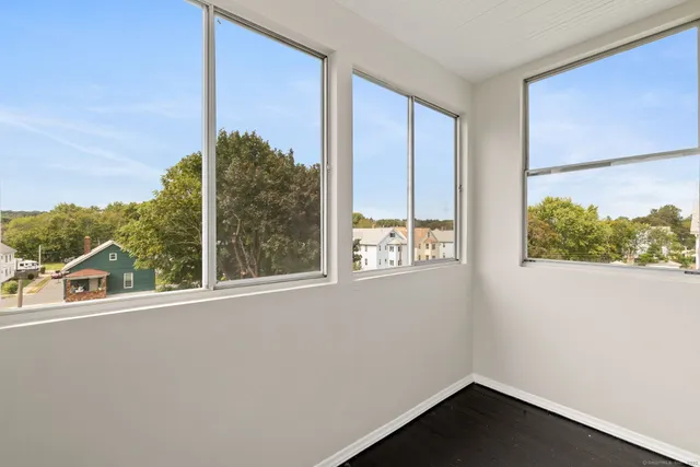 a view of a balcony with an outdoor space