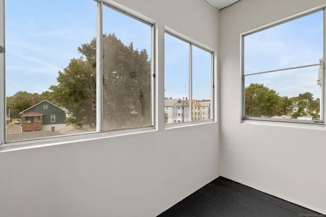 an empty room with a window